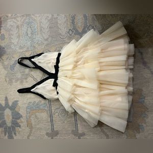 Mable size S. upscale boutique in Birmingham. Worn once. Ivory w black details.